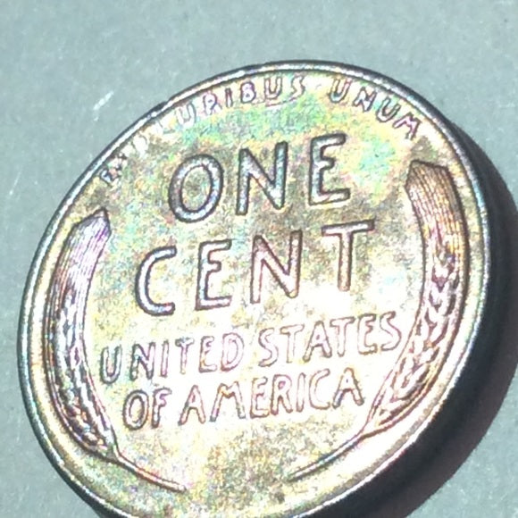 About Uncirculated 1958D Rainbow Toned Wheat Penny- Multicolored Toning